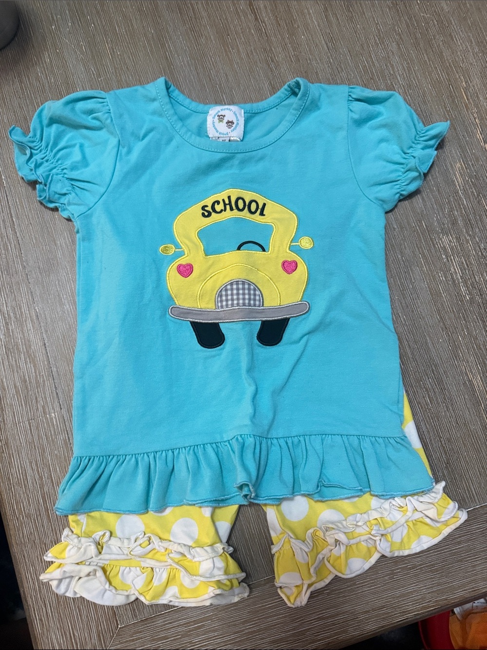 Turquoise School Bus Toddler Top with Yellow Polka Dot Ruffle Shorts